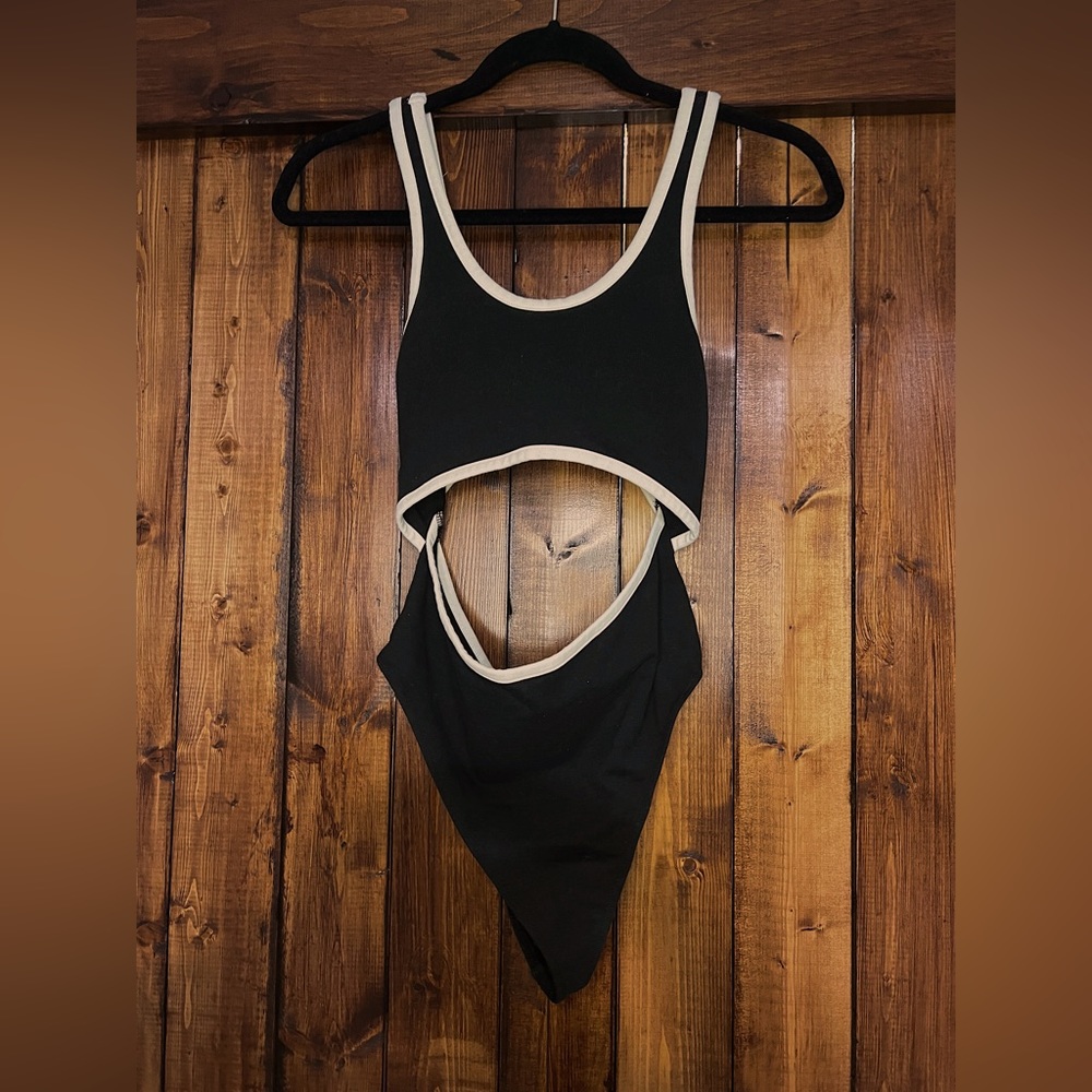 Urban Outfitters, black bodysuit with cut outs and white trim, medium